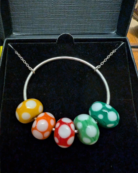 Tactile silver jewellery piece